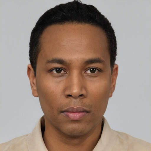 Neutral black young-adult male with short  black hair and brown eyes