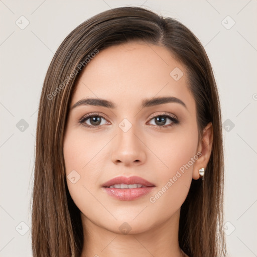 Neutral white young-adult female with long  brown hair and brown eyes