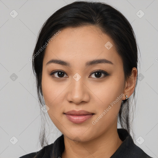 Joyful latino young-adult female with medium  black hair and brown eyes