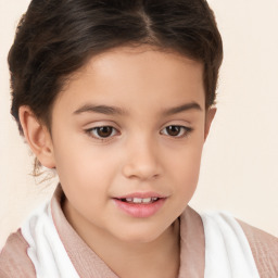 Joyful white child female with short  brown hair and brown eyes