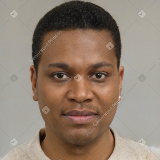 Joyful black young-adult male with short  brown hair and brown eyes