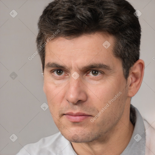 Neutral white adult male with short  brown hair and brown eyes