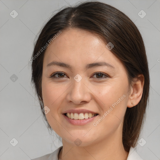 Joyful white young-adult female with medium  brown hair and brown eyes