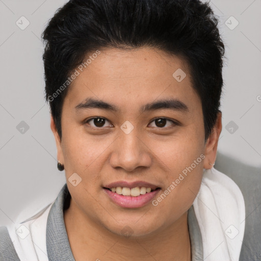 Joyful asian young-adult male with short  brown hair and brown eyes