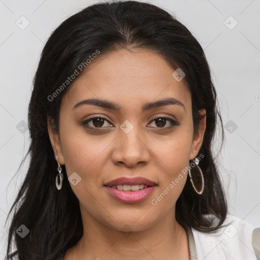 Joyful latino young-adult female with long  brown hair and brown eyes