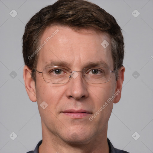 Joyful white adult male with short  brown hair and grey eyes