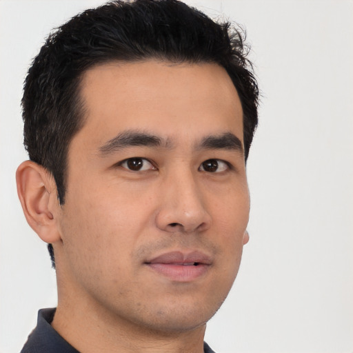 Neutral asian young-adult male with short  brown hair and brown eyes
