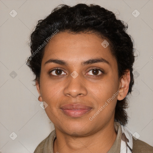 Joyful black young-adult female with short  brown hair and brown eyes