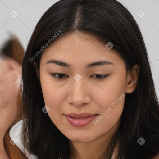 Joyful asian young-adult female with long  brown hair and brown eyes