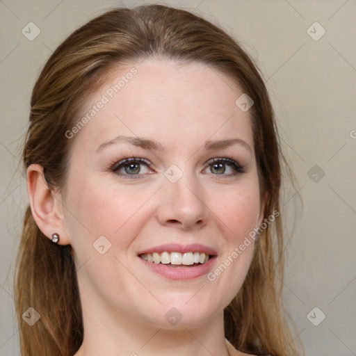 Joyful white young-adult female with medium  brown hair and blue eyes