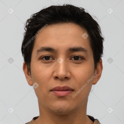 Joyful latino young-adult male with short  brown hair and brown eyes