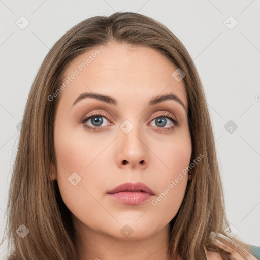 Neutral white young-adult female with long  brown hair and brown eyes