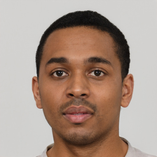 Neutral black young-adult male with short  black hair and brown eyes