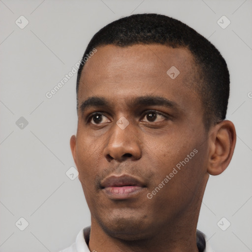 Neutral black young-adult male with short  black hair and brown eyes