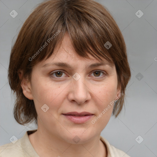 Joyful white adult female with medium  brown hair and grey eyes