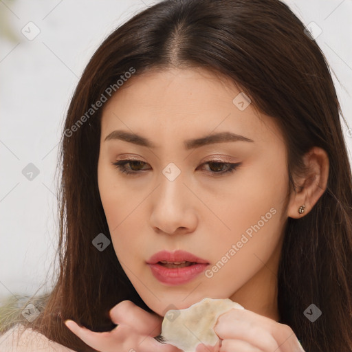 Neutral white young-adult female with long  brown hair and brown eyes