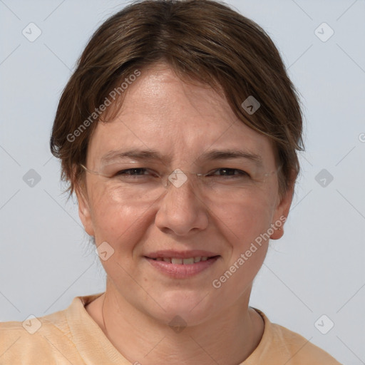 Joyful white adult female with medium  brown hair and brown eyes