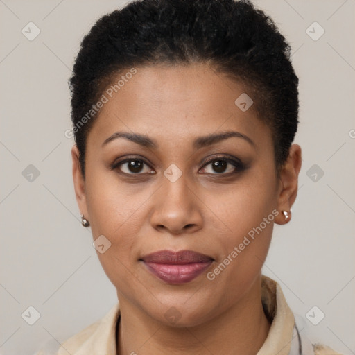 Joyful black young-adult female with short  brown hair and brown eyes