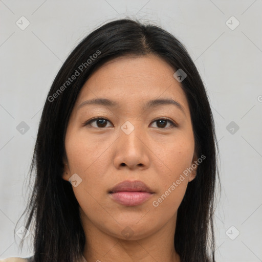 Joyful asian young-adult female with long  brown hair and brown eyes