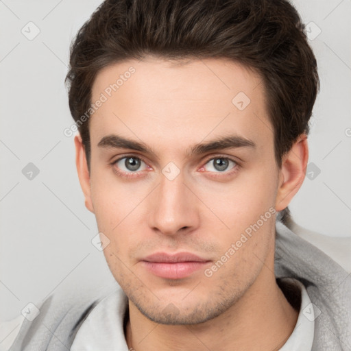 Neutral white young-adult male with short  brown hair and brown eyes