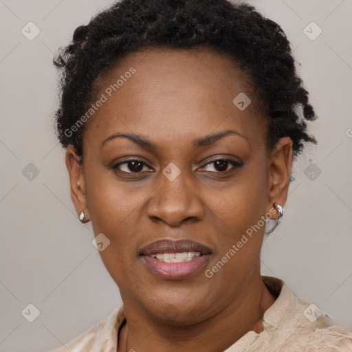 Joyful black adult female with short  brown hair and brown eyes