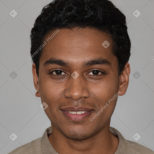 Joyful black young-adult male with short  black hair and brown eyes