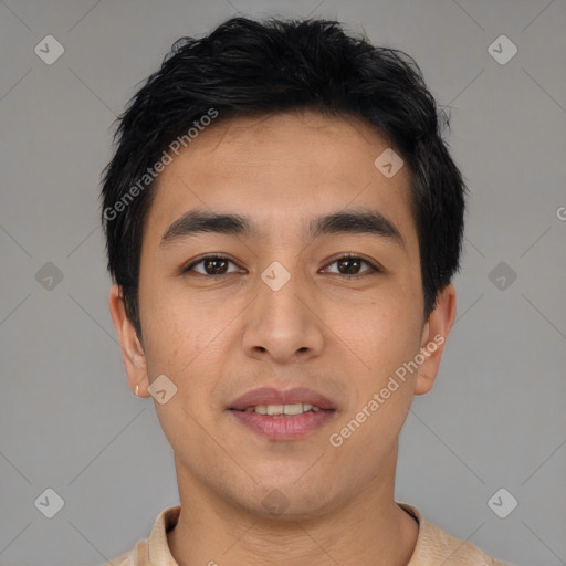 Joyful asian young-adult male with short  black hair and brown eyes