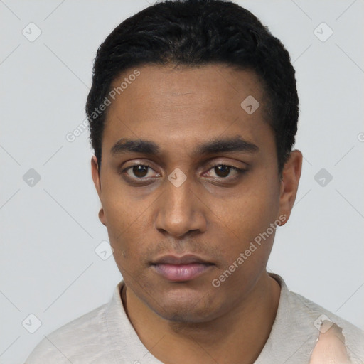 Neutral latino young-adult male with short  black hair and brown eyes