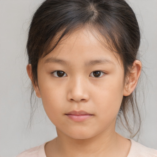 Neutral asian child female with medium  brown hair and brown eyes