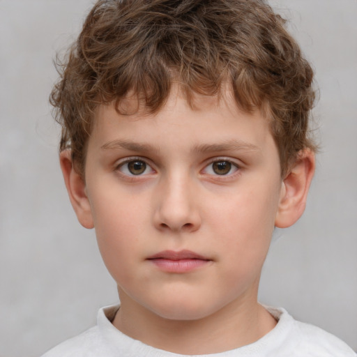 Neutral white child male with short  brown hair and brown eyes