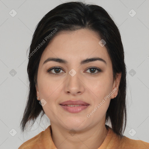 Joyful latino young-adult female with medium  brown hair and brown eyes