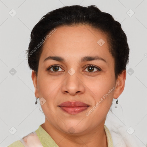 Joyful latino young-adult female with short  brown hair and brown eyes