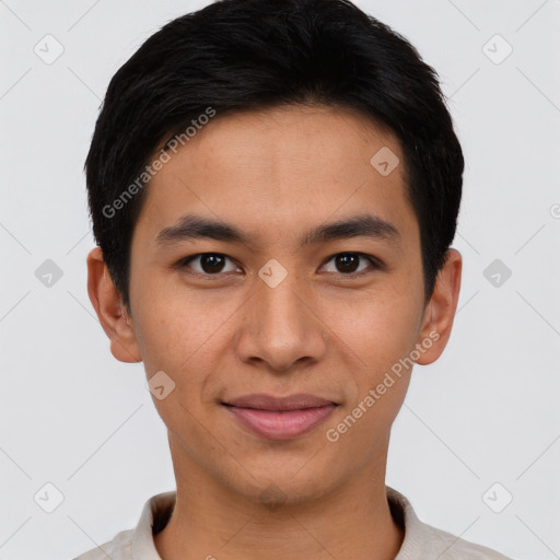 Joyful asian young-adult male with short  black hair and brown eyes