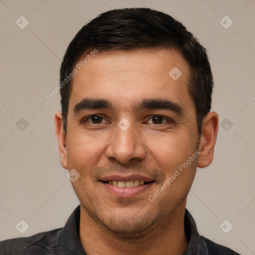 Joyful white young-adult male with short  black hair and brown eyes