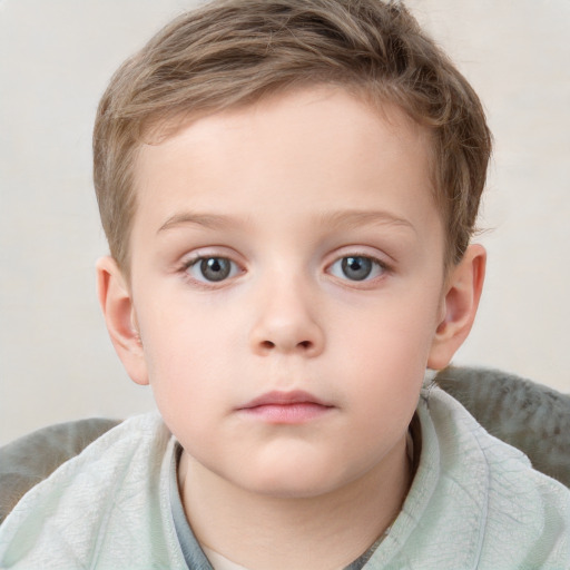 Neutral white child male with short  brown hair and blue eyes