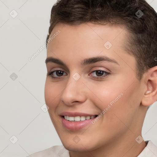 Joyful white young-adult female with short  brown hair and brown eyes