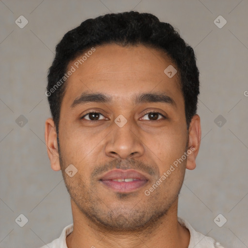Neutral latino young-adult male with short  brown hair and brown eyes