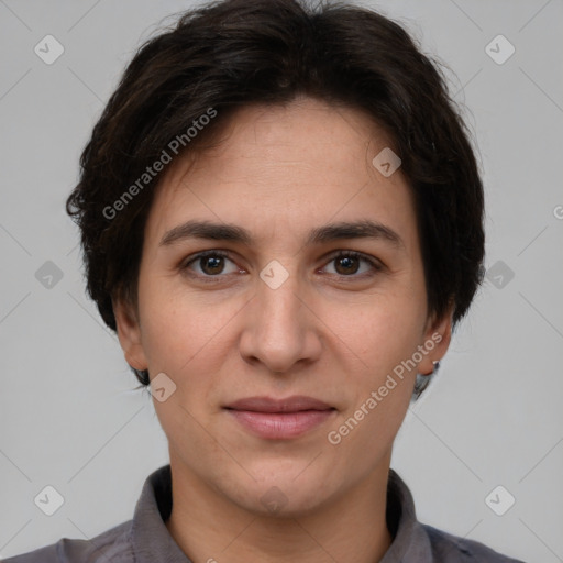 Joyful white adult female with short  brown hair and brown eyes