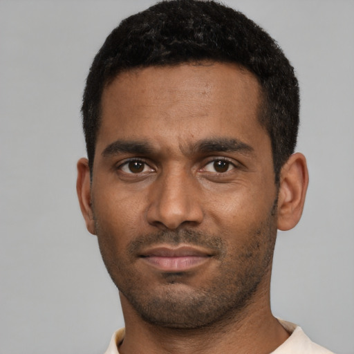 Neutral black young-adult male with short  black hair and brown eyes