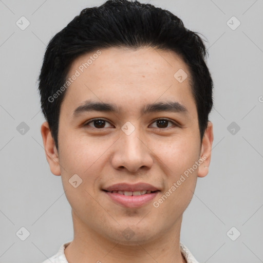 Joyful latino young-adult male with short  brown hair and brown eyes