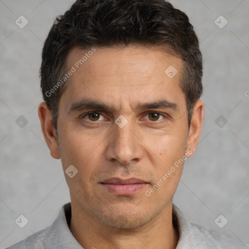 Neutral white adult male with short  black hair and brown eyes