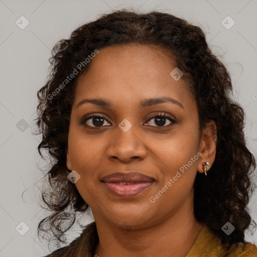 Joyful black young-adult female with long  brown hair and brown eyes