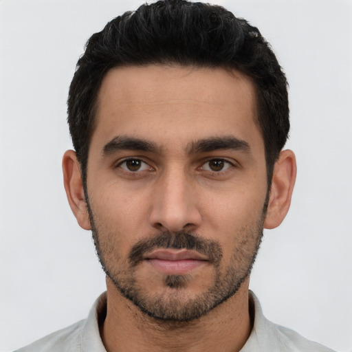 Neutral white young-adult male with short  black hair and brown eyes