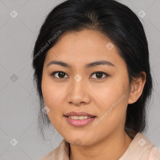 Joyful asian young-adult female with medium  brown hair and brown eyes