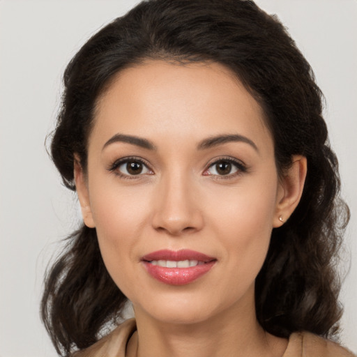 Joyful white young-adult female with long  brown hair and brown eyes