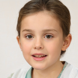 Joyful white child female with short  brown hair and brown eyes