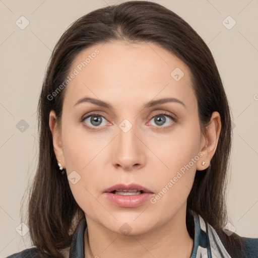 Neutral white young-adult female with medium  brown hair and brown eyes