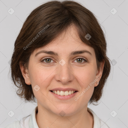 Joyful white young-adult female with medium  brown hair and grey eyes