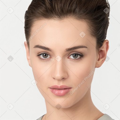 Neutral white young-adult female with short  brown hair and brown eyes