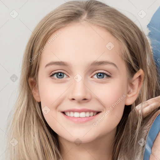 Joyful white child female with long  brown hair and brown eyes